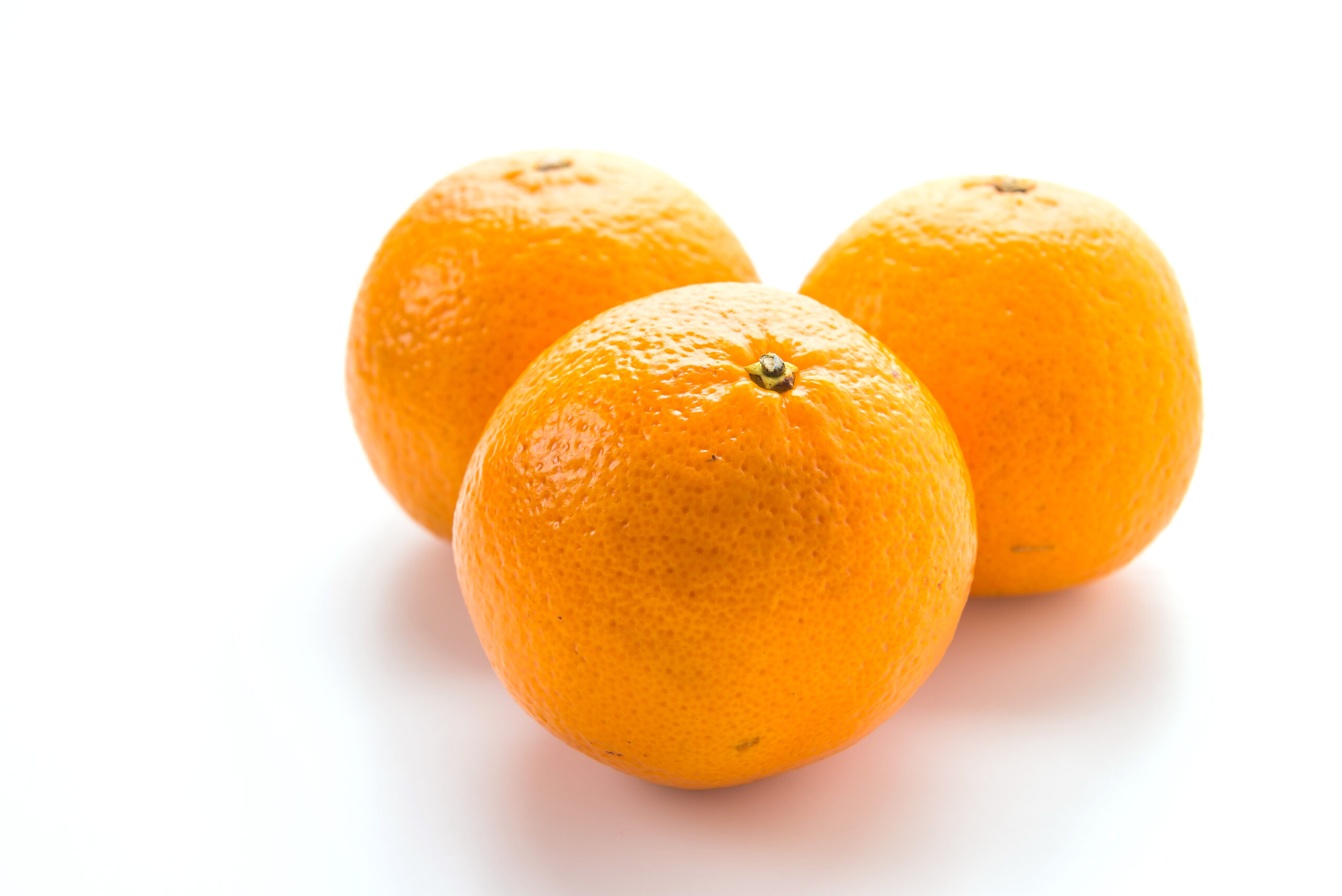 Orange fruit isolated on white